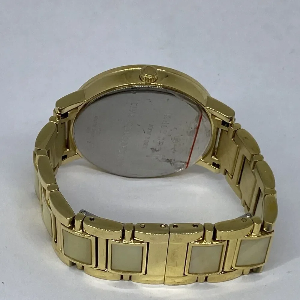 Kate Spade 0394 Womens Gold Stainless Steel Analog Dial Quartz Wrist Watch XX581